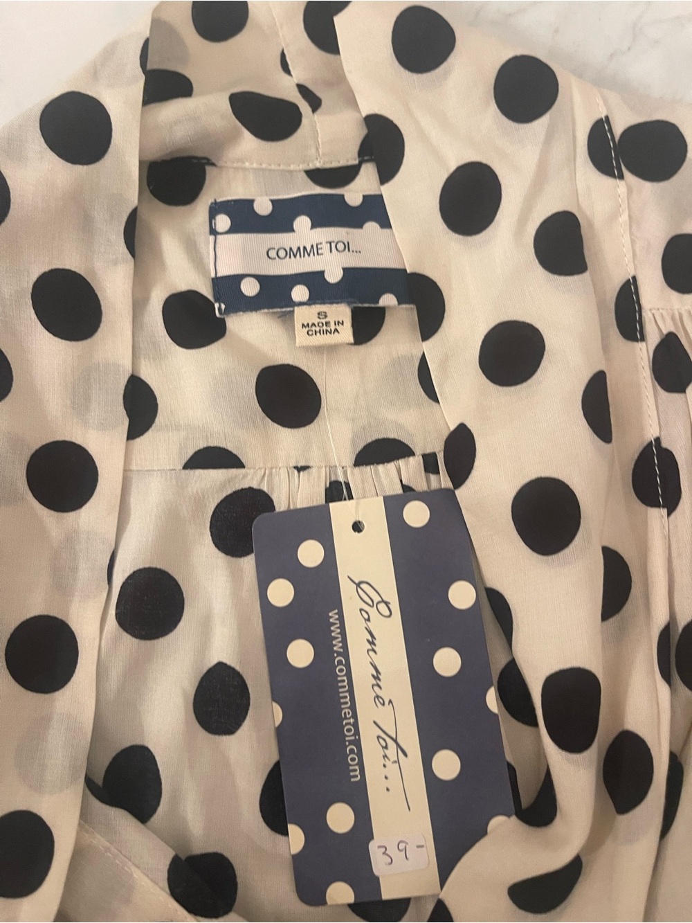 Sleeveless Polka Dot Tie-Neck Blouse in Cream and Black - Picture 3 of 4